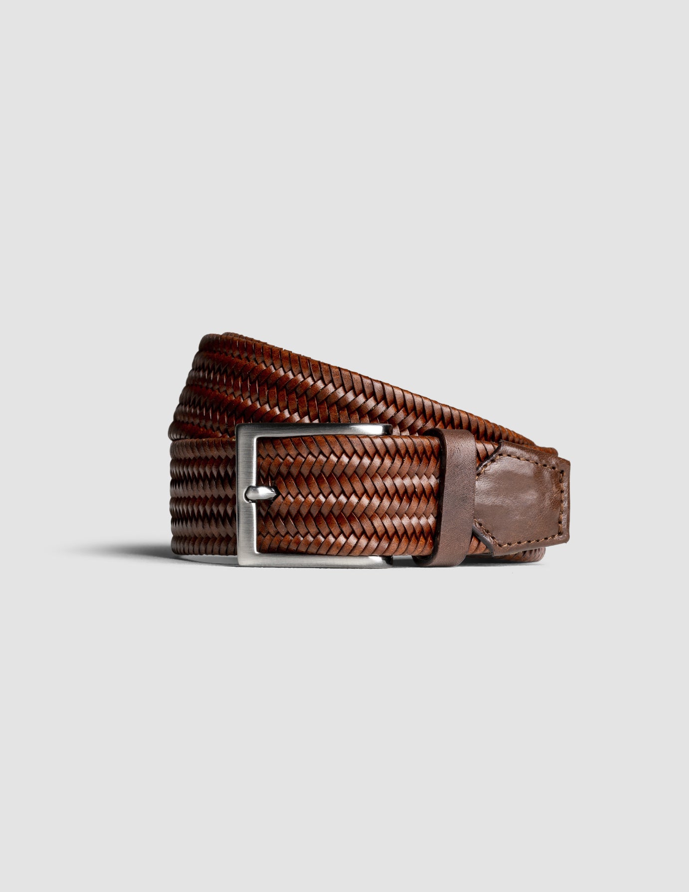 Braided elastic cognac belt in bonded leather